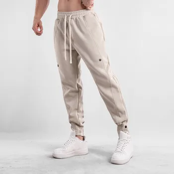 Мужские стильные спортивные штаны с морщинами Дизайн пуговиц Брюки Однотонный шнурок Брюки с двойным карманом Повседневная одежда